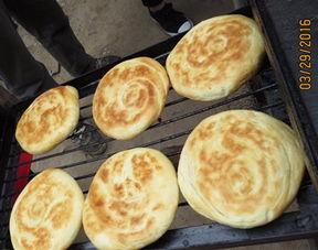 打烧饼视频,一饼一世界，传统与现代的完美融合